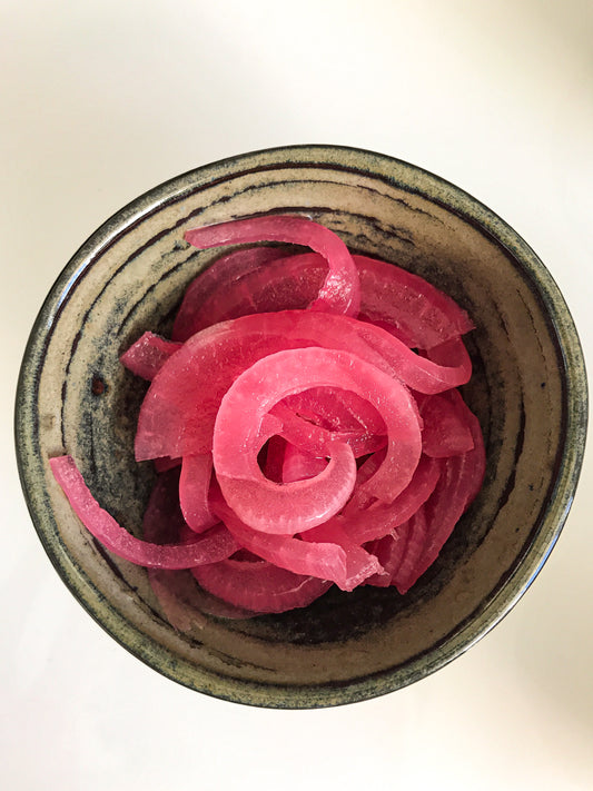 Pickled red onions with citrus